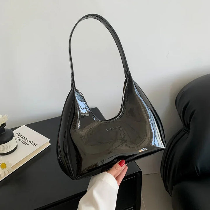Elegant burgundy shoulder bag with a patent finish