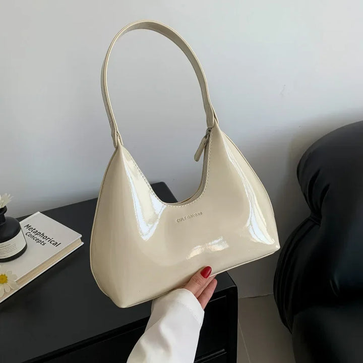 Elegant burgundy shoulder bag with a patent finish