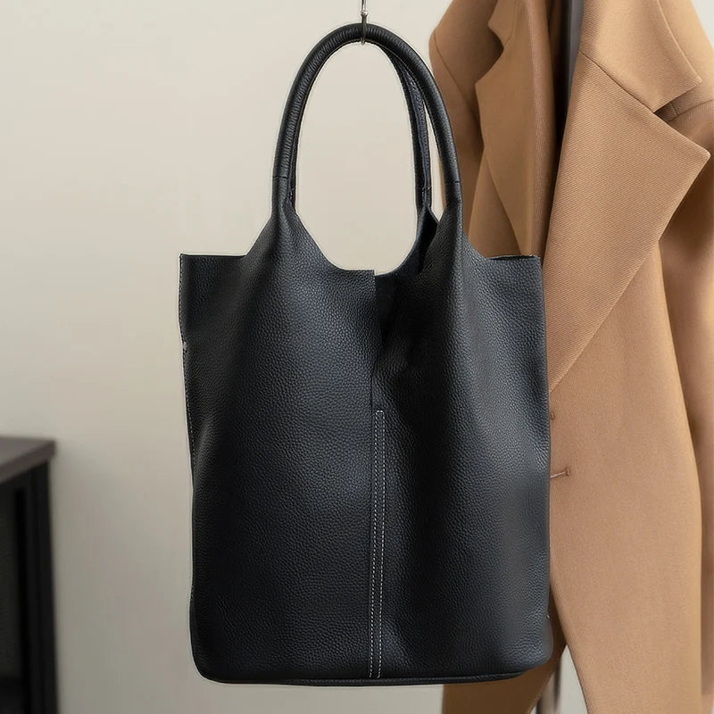 Light blue bucket bag with a luxurious leather look